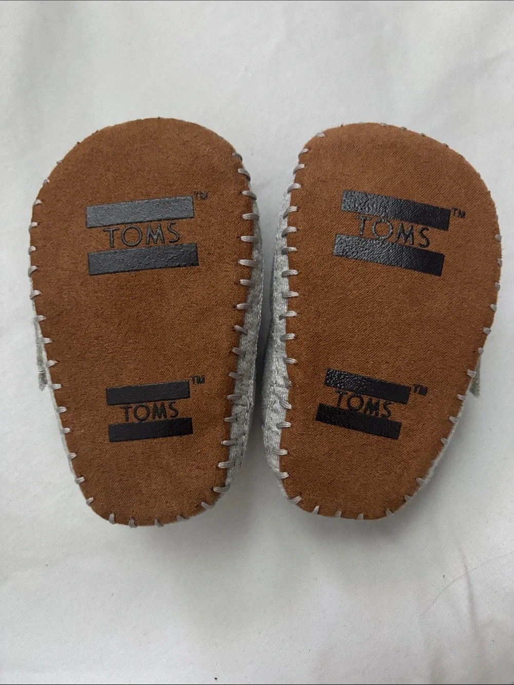 Toms Baby Gray Slip-On Shoes with Yellow Lining